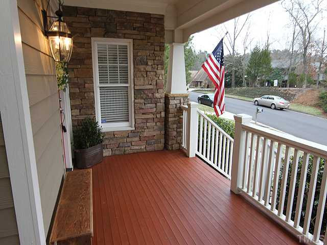 4024 Swarthmore Road Durham, NC 27707 - Photo 23 of 25 The wrap-around porch is an invitation to sit a while with your neighbors and friends. Note the stacked stone facade! Porch