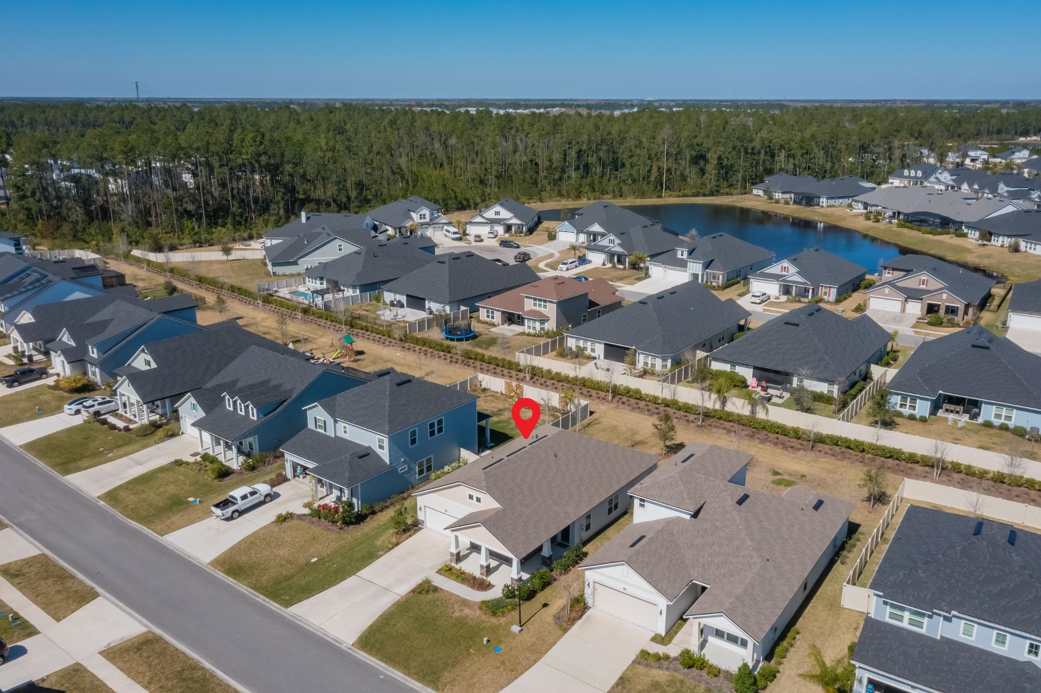 98 Windermere Way St. Augustine, FL 32095 - Photo 51 of 76 an aerial view of a house with a lake view