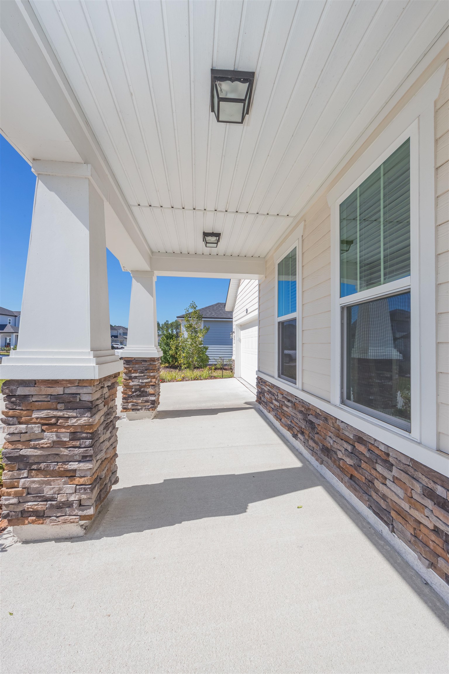98 Windermere Way St. Augustine, FL 32095 - Photo 6 of 76 a view of front door and porch