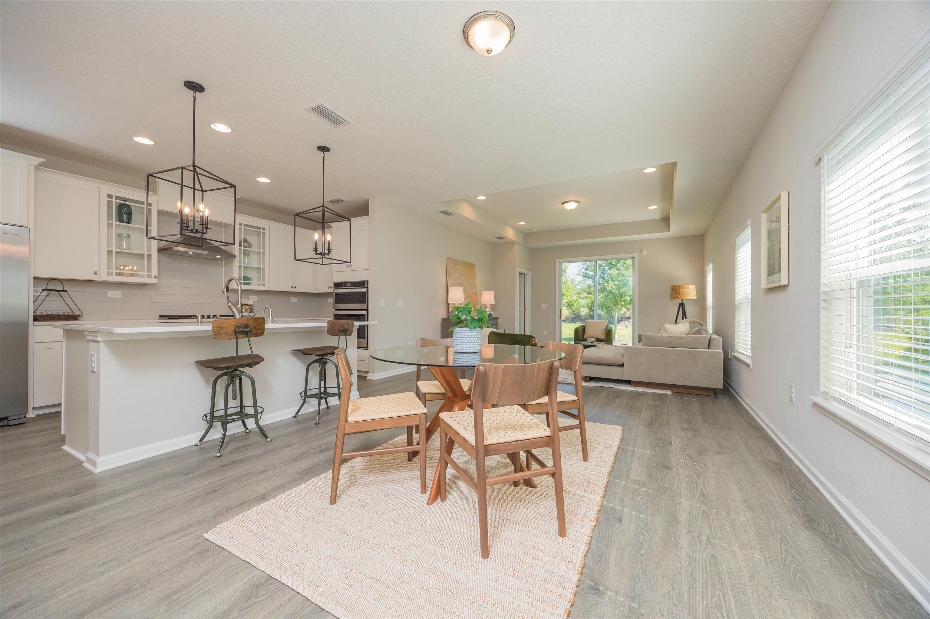 98 Windermere Way St. Augustine, FL 32095 - Photo 9 of 76 a dining room with furniture and a large window