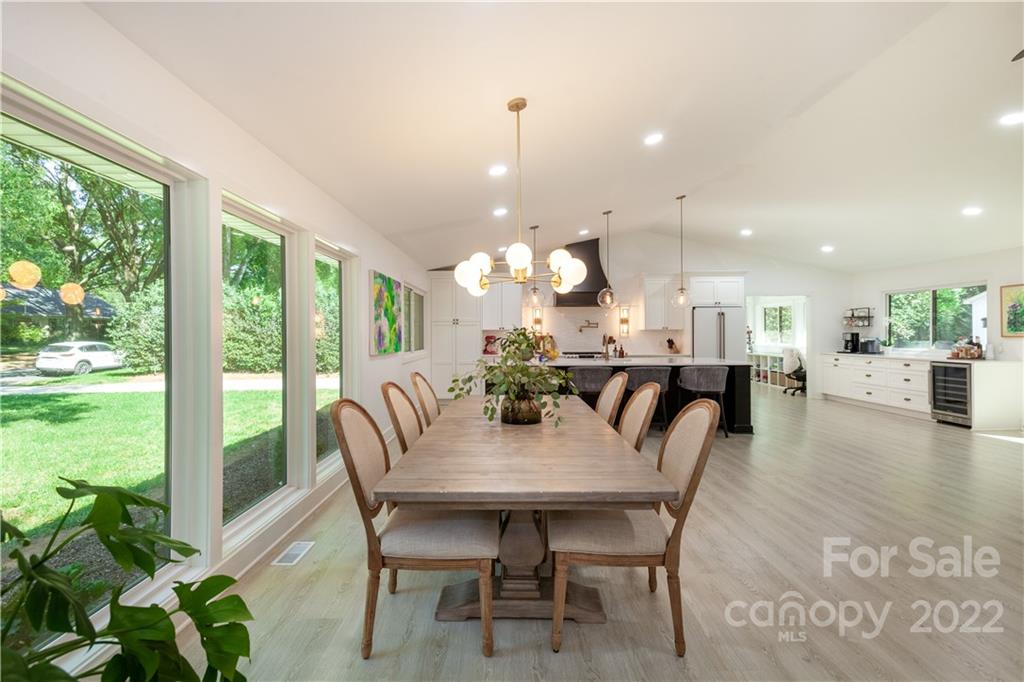 621 Wingrave Drive Charlotte, NC 28270 - Photo 13 of 48 a dining room with furniture window and wooden floor