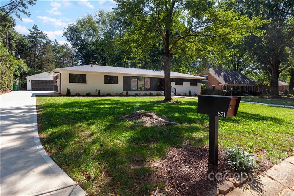 621 Wingrave Drive Charlotte, NC 28270 - Photo 2 of 48 a front view of a house with garden