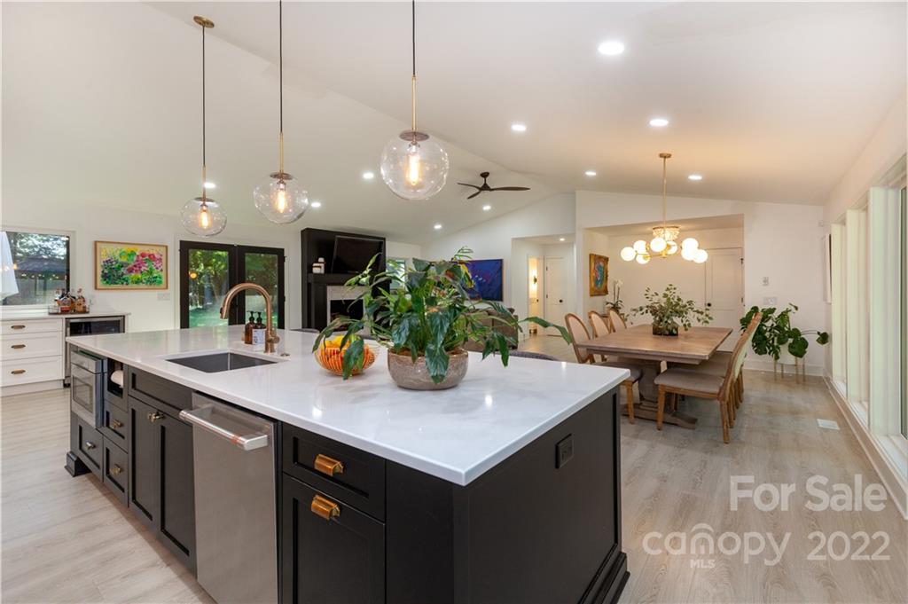 621 Wingrave Drive Charlotte, NC 28270 - Photo 22 of 48 a kitchen with sink and view of living room