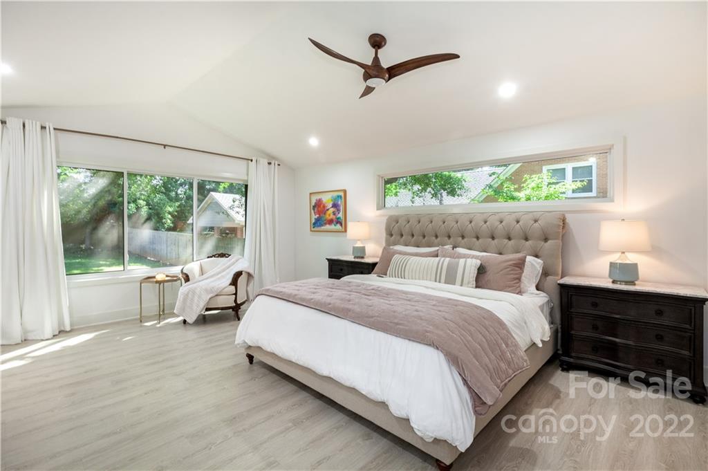 621 Wingrave Drive Charlotte, NC 28270 - Photo 30 of 48 a bedroom with a large bed and a window