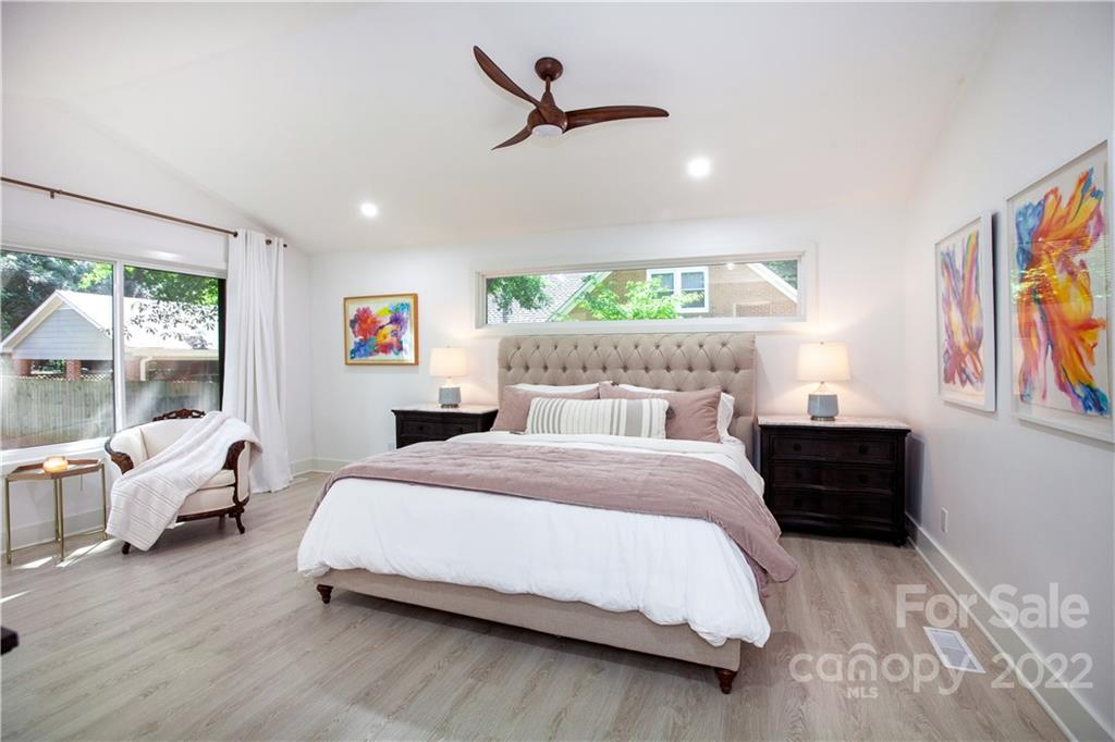 621 Wingrave Drive Charlotte, NC 28270 - Photo 31 of 48 a bedroom with a bed window and couch