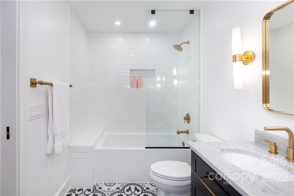 621 Wingrave Drive Charlotte, NC 28270 - Photo 35 of 48 a bathroom with a granite countertop sink toilet and shower