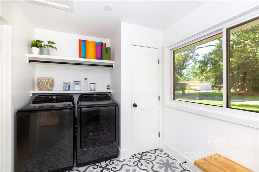 621 Wingrave Drive Charlotte, NC 28270 - Photo 45 of 48 a view of a bedroom with baby bed and a window