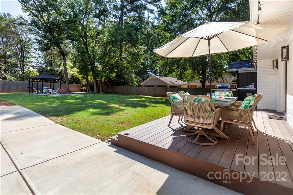 621 Wingrave Drive Charlotte, NC 28270 - Photo 47 of 48 a view of a backyard with sitting area and furniture