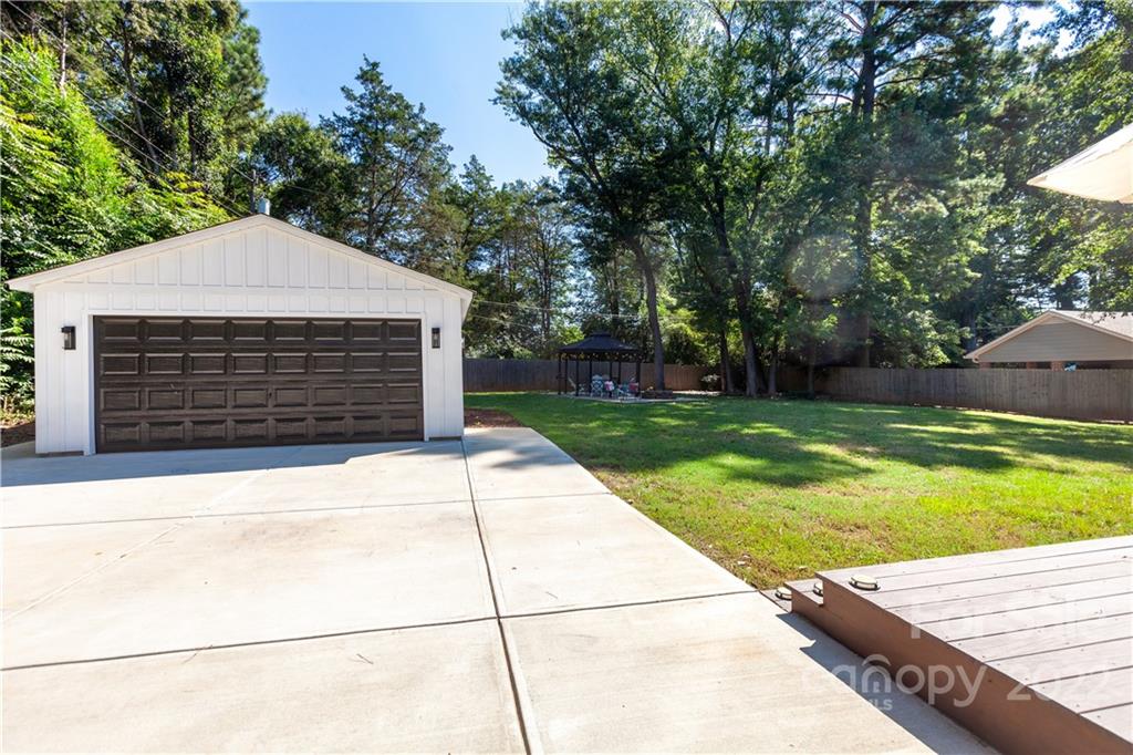 621 Wingrave Drive Charlotte, NC 28270 - Photo 48 of 48 a front view of a house with garden