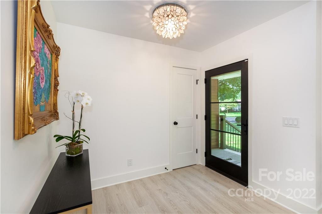 621 Wingrave Drive Charlotte, NC 28270 - Photo 7 of 48 a view of an entryway with a chandelier