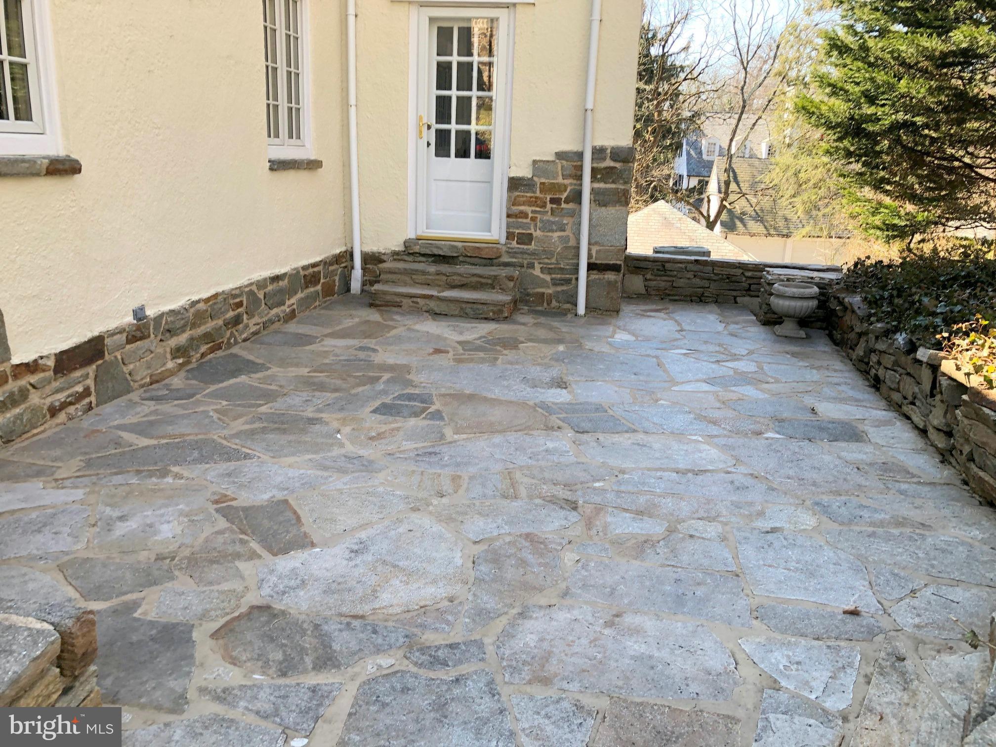 207 Tunbridge Road Baltimore, MD 21212 - Photo 11 of 43 The stone patio is perfect for dining alfresco.