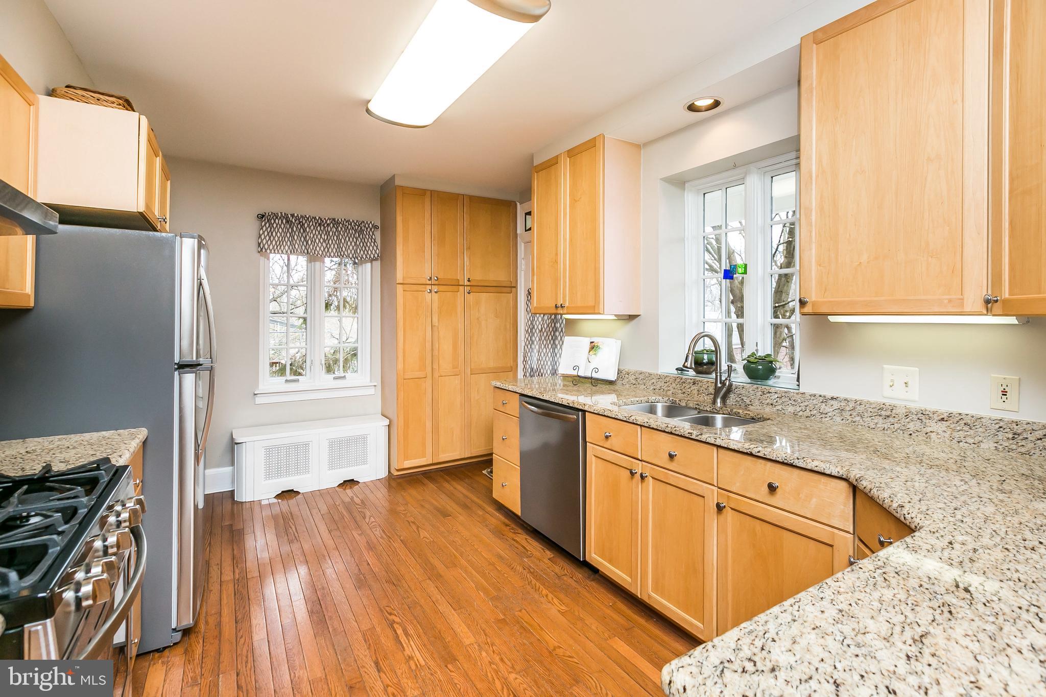 207 Tunbridge Road Baltimore, MD 21212 - Photo 16 of 43 The kitchen has granite counter tops.