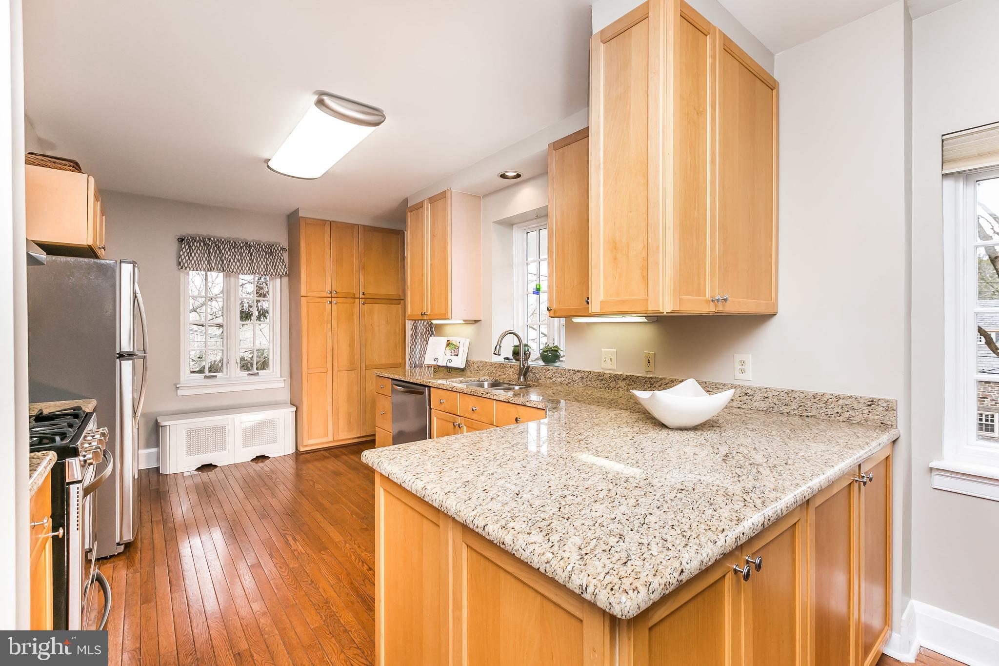 207 Tunbridge Road Baltimore, MD 21212 - Photo 17 of 43 The kitchen has stainless steel appliances