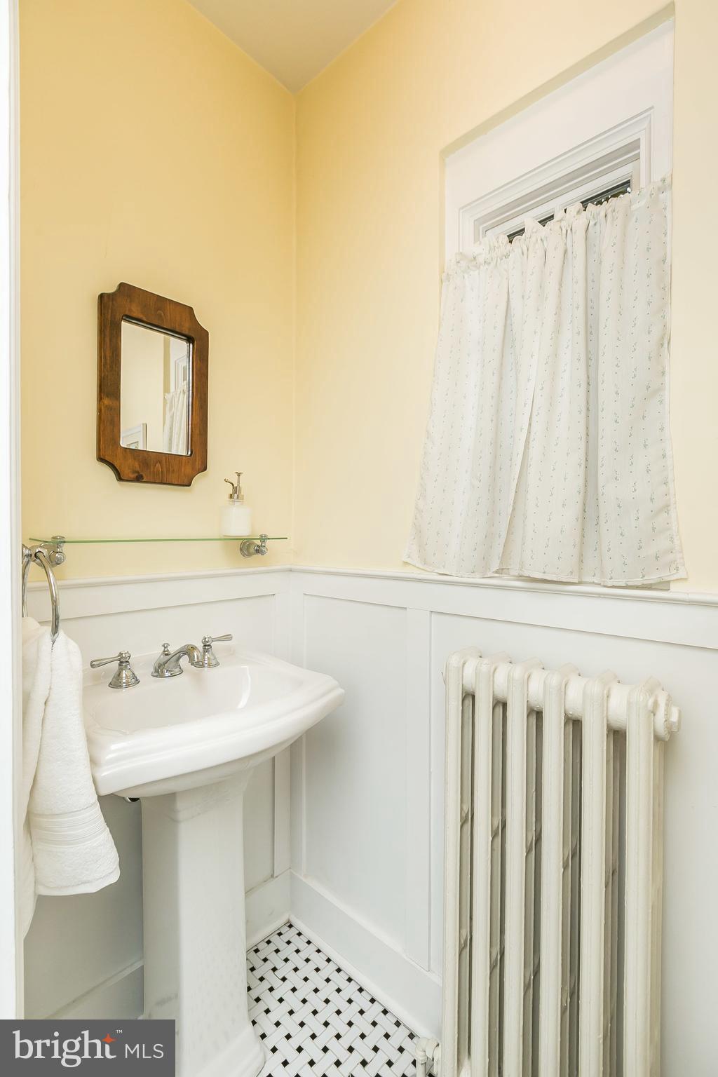 207 Tunbridge Road Baltimore, MD 21212 - Photo 20 of 43 There's a powder room off the foyer