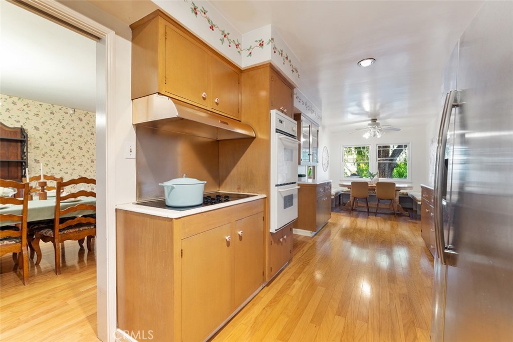 1940 Arroyo Drive Riverside, CA 92506 - Photo 13 of 50 Galley kitchen with two points of access to the formal dining room