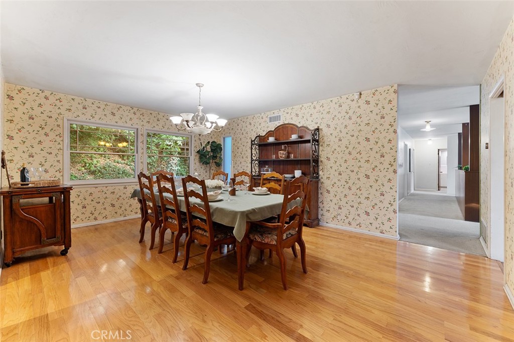 1940 Arroyo Drive Riverside, CA 92506 - Photo 16 of 50 Very roomy formal dining room with two points of access to the kitchen and a throughway to the den and throughway to the entyr/living.