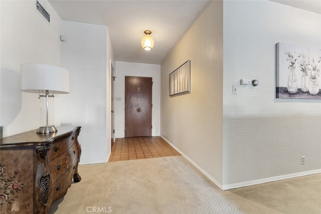 1940 Arroyo Drive Riverside, CA 92506 - Photo 17 of 50 Formal entry with closet. To the right leads to an open hallway to the 3 of 4 bedrooms and 2 of 3 bathrooms.