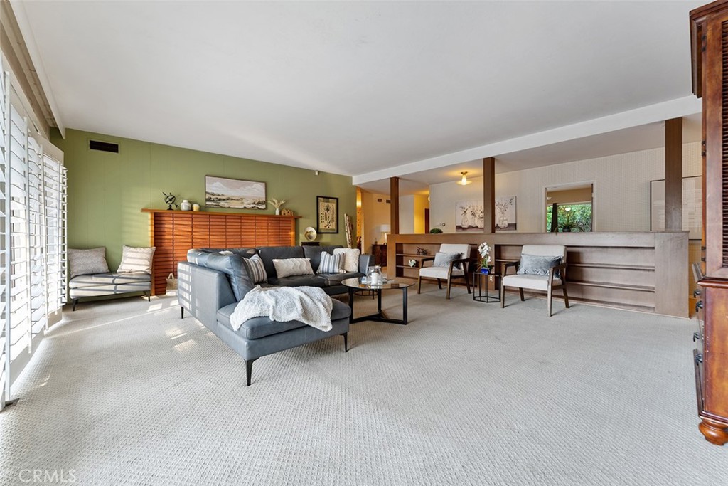 1940 Arroyo Drive Riverside, CA 92506 - Photo 21 of 50 Formal living room with open hallway and functioning fireplace.