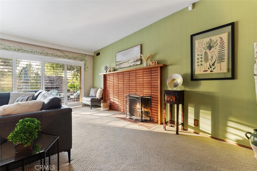1940 Arroyo Drive Riverside, CA 92506 - Photo 23 of 50 Formal living room with functioning fireplace and sliders to the backyard.