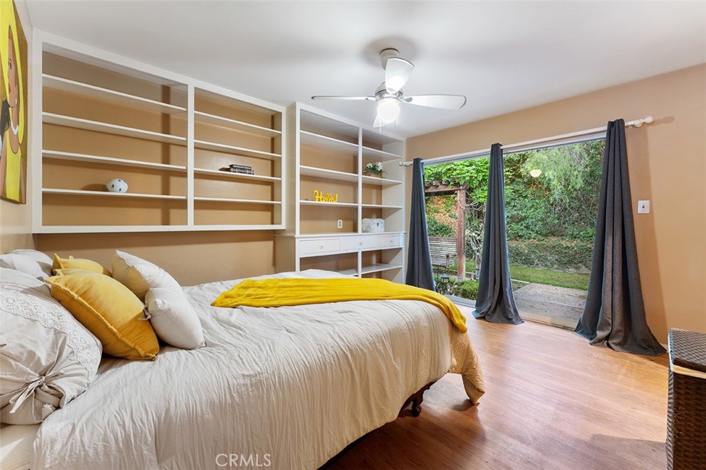 1940 Arroyo Drive Riverside, CA 92506 - Photo 24 of 50 Built ins and sliders to the front yard (which feels like a second backyard). 2 of 4 bedrooms.