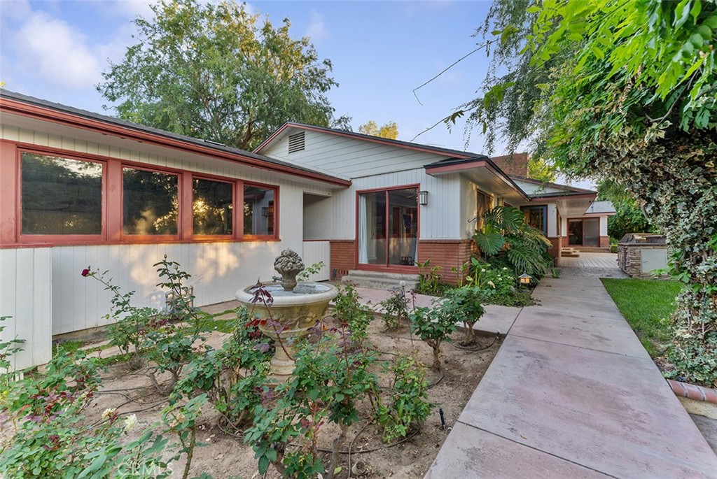 1940 Arroyo Drive Riverside, CA 92506 - Photo 45 of 50 Windows belong to the garage. Rose garden and fountain to enjoy.