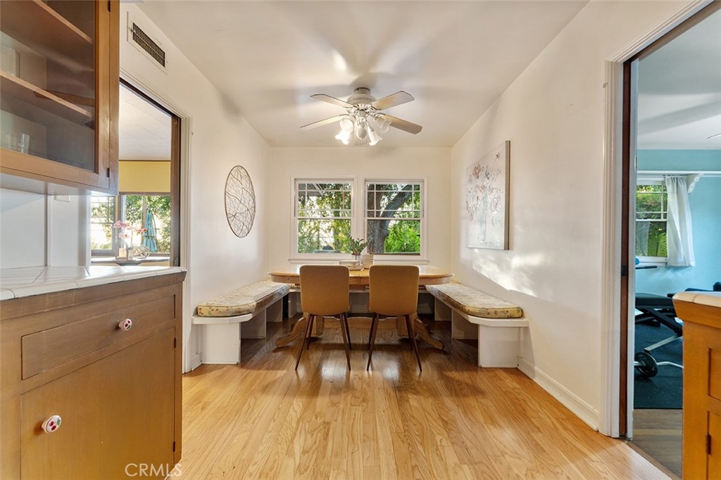 1940 Arroyo Drive Riverside, CA 92506 - Photo 10 of 50 Spacious breakfast nook with view of backyard. Doorway to the right leads to 1 of 4 bedrooms. This bedroom is on the opposite wing from the others.