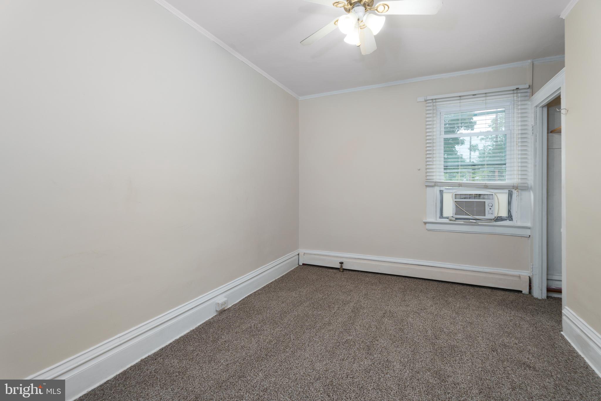 124 Washington Road, Unit 2 Princeton, NJ 08540 - Photo 11 of 13 an empty room with windows