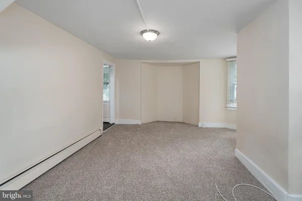 an empty room with an entryway