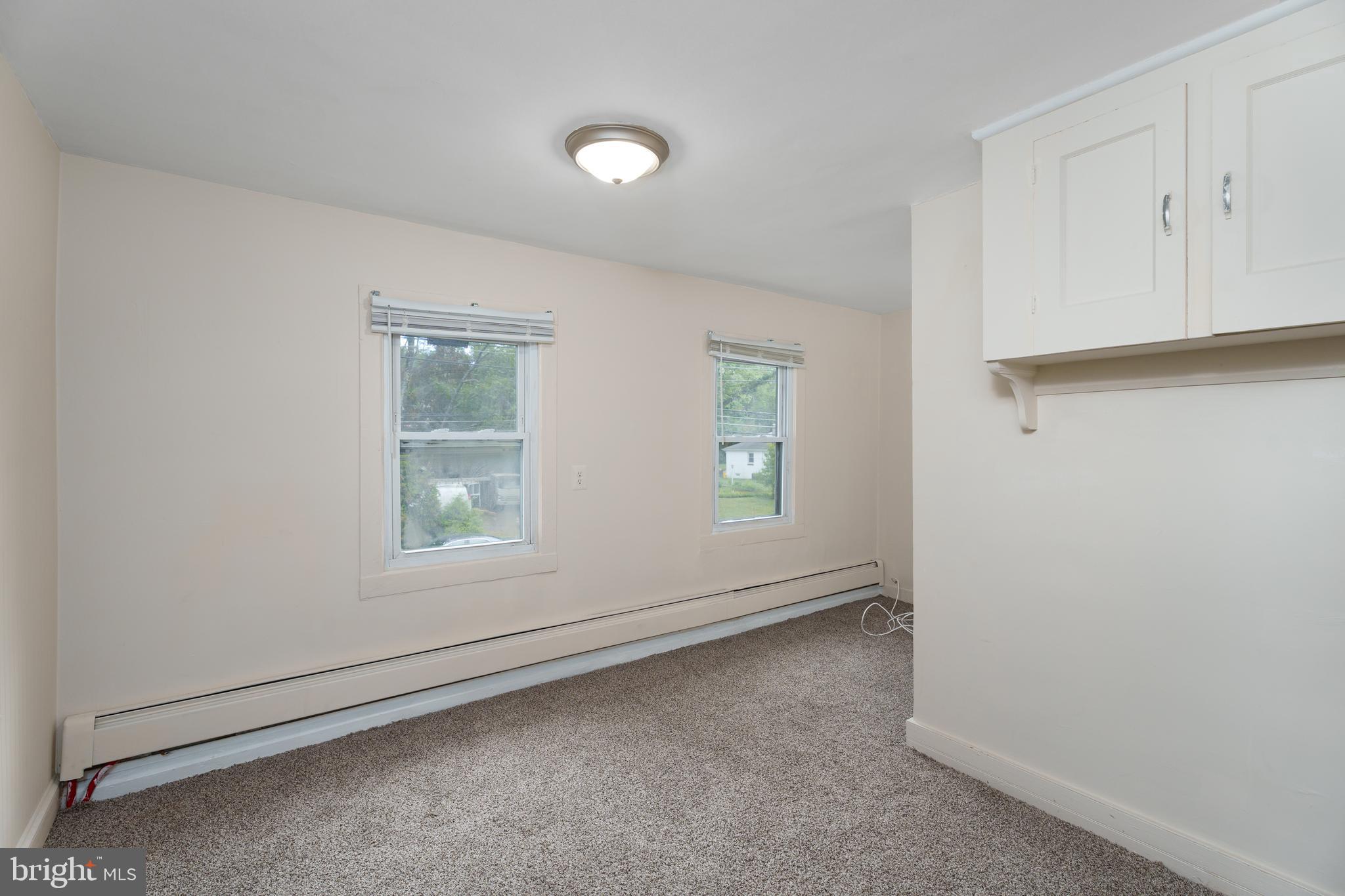 124 Washington Road, Unit 2 Princeton, NJ 08540 - Photo 10 of 13 an empty room with a window