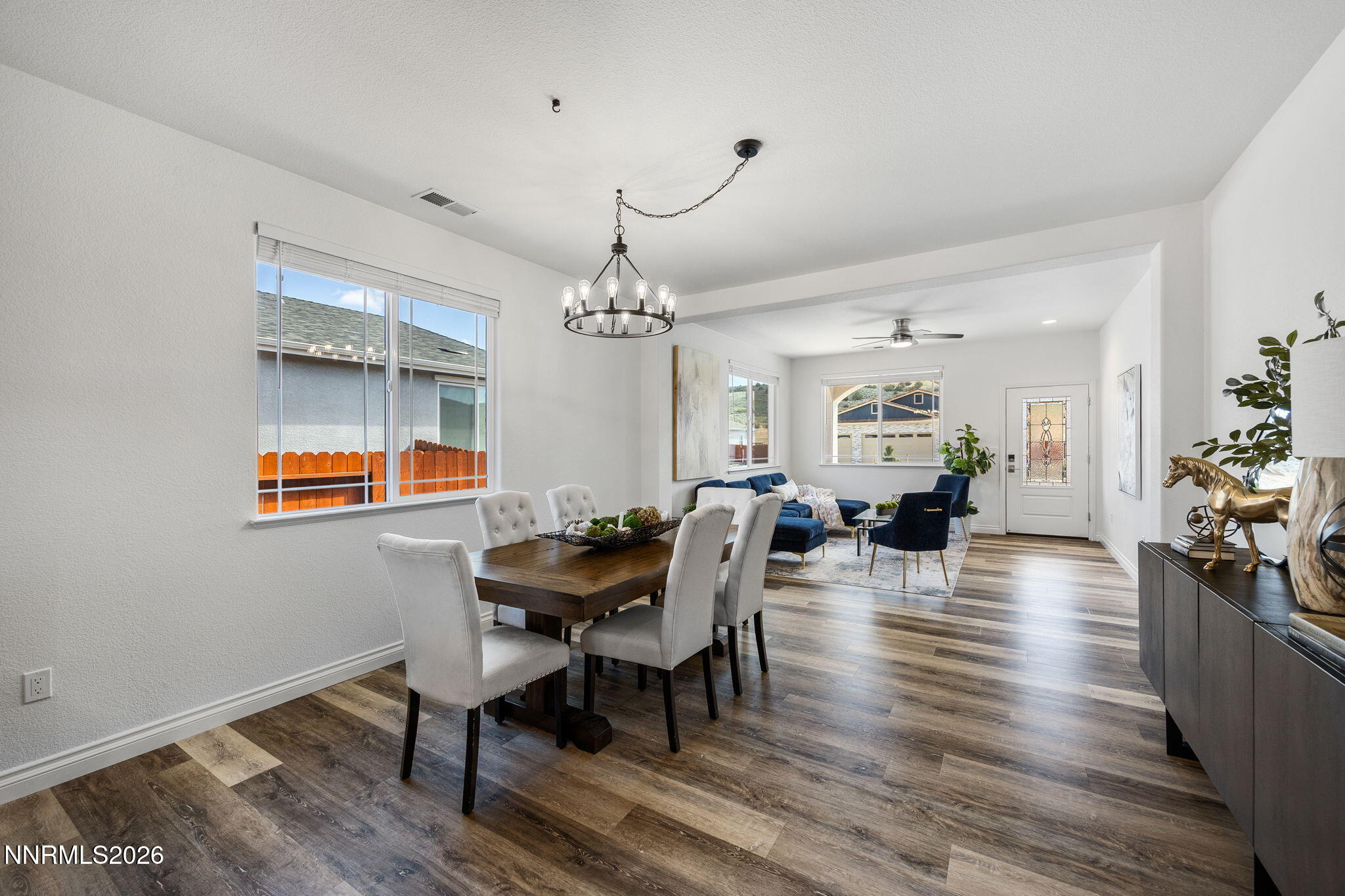 19013 Alpine Walk Reno, NV 89508 - Photo 11 of 34 a view of a dining room with furniture and wooden floor