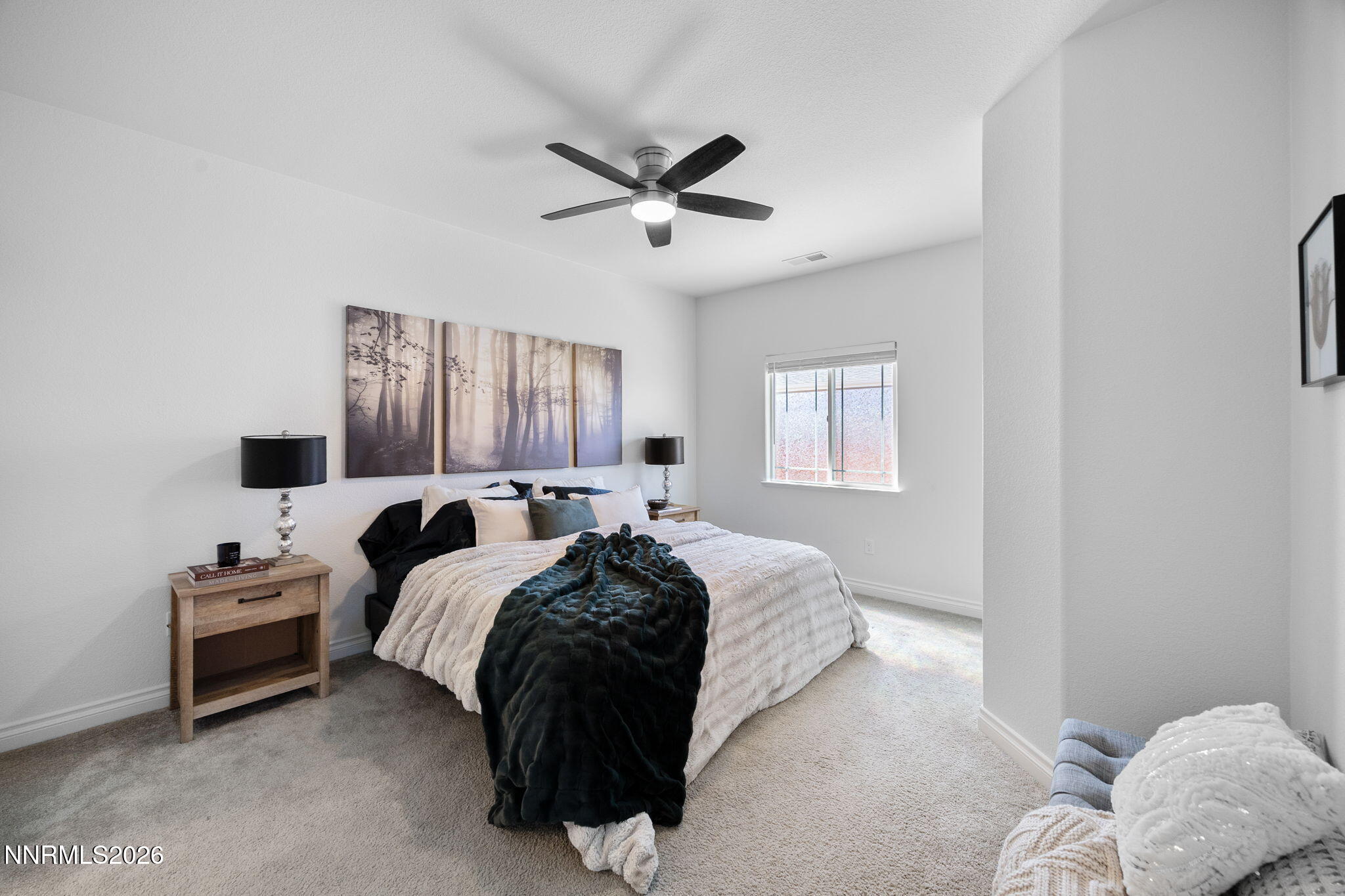 19013 Alpine Walk Reno, NV 89508 - Photo 17 of 34 a bed room with a bed and a window