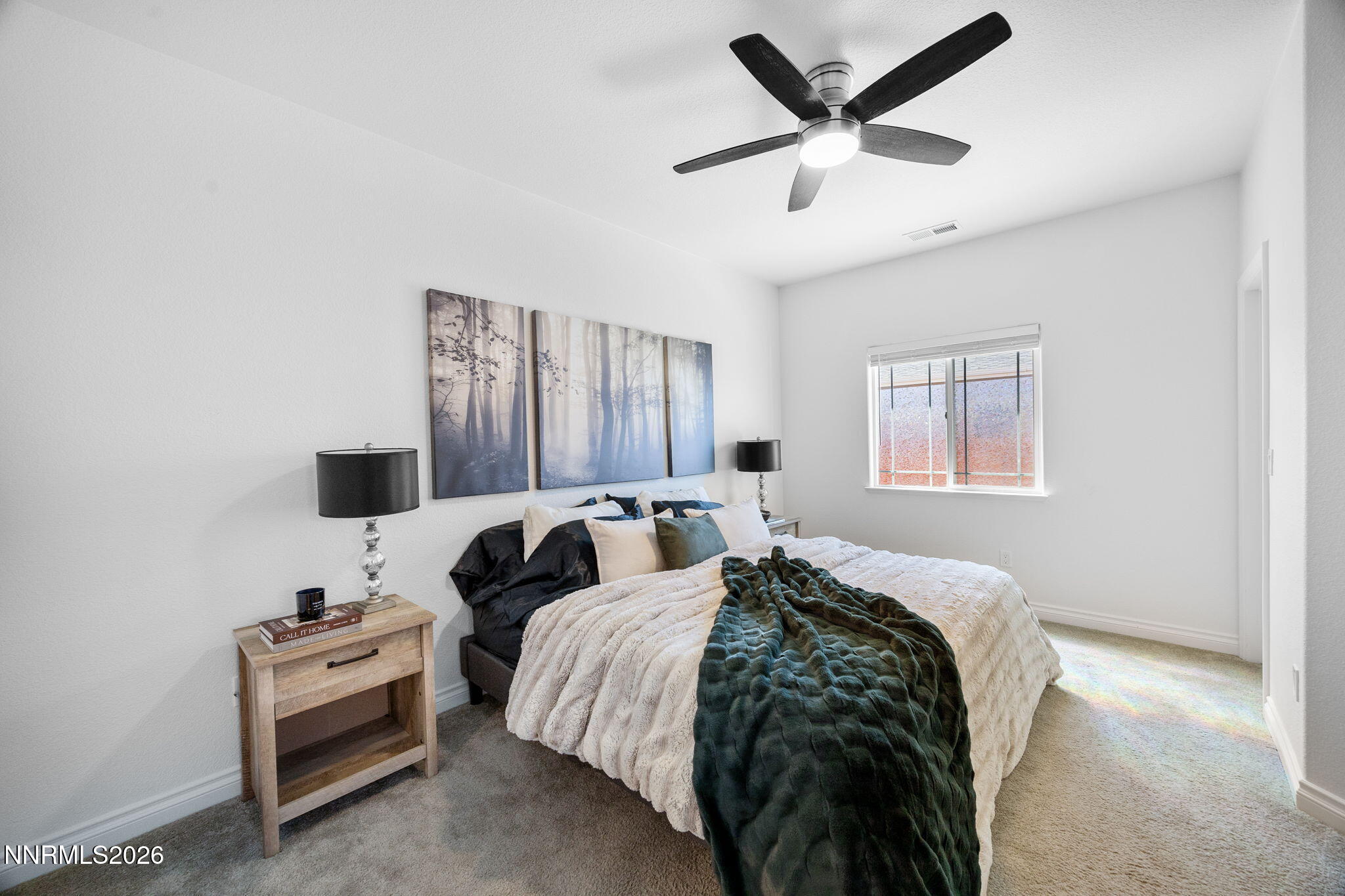 19013 Alpine Walk Reno, NV 89508 - Photo 18 of 34 a bedroom with a bed and a window