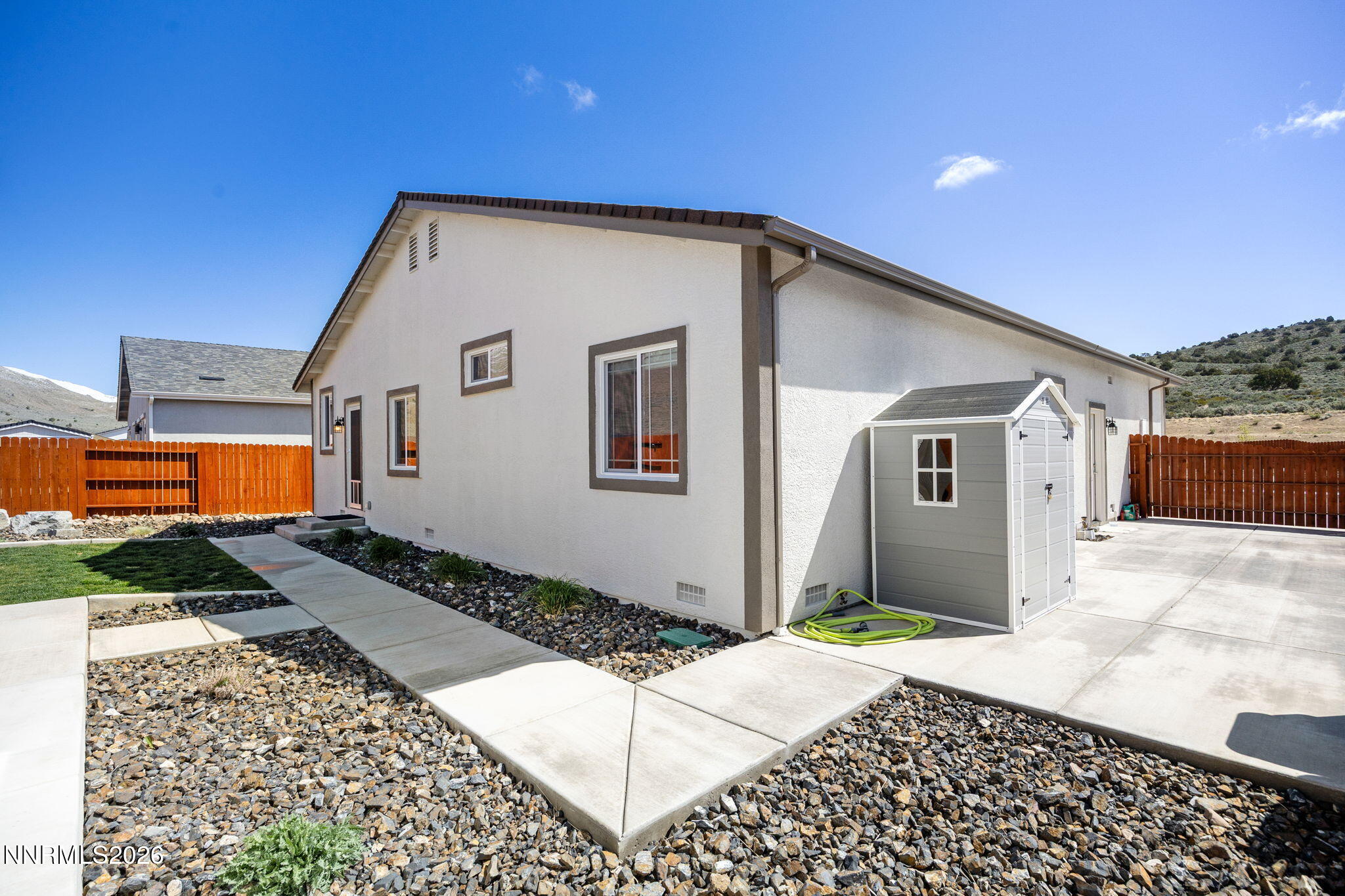 19013 Alpine Walk Reno, NV 89508 - Photo 32 of 34 a front view of a house with a yard