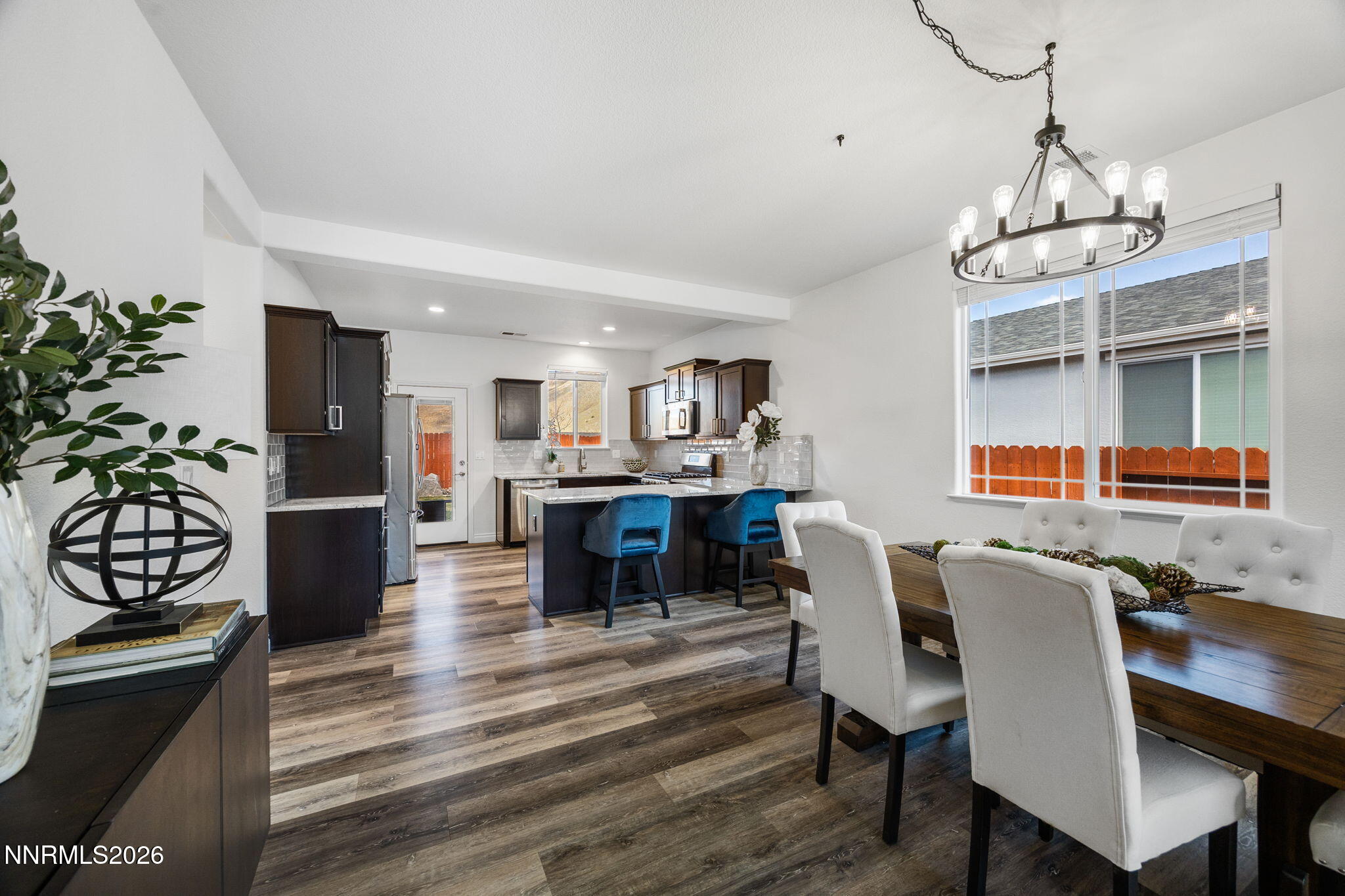 19013 Alpine Walk Reno, NV 89508 - Photo 8 of 34 a view of a dining room with furniture and wooden floor