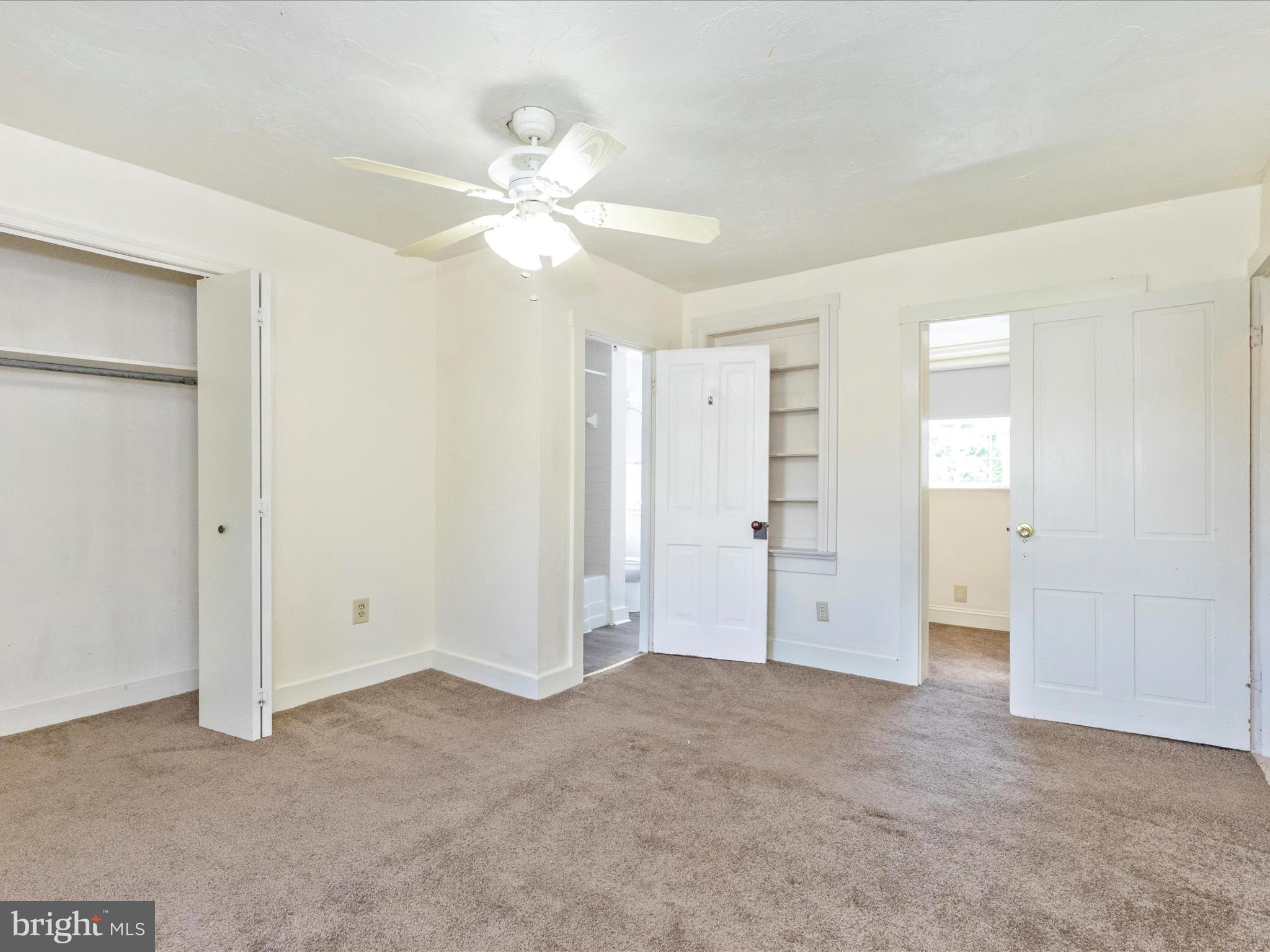 1404 Pleasant Valley Road, Unit 2 Westminster, MD 21158 - Photo 32 of 43 a view of empty room with window and ceiling fan