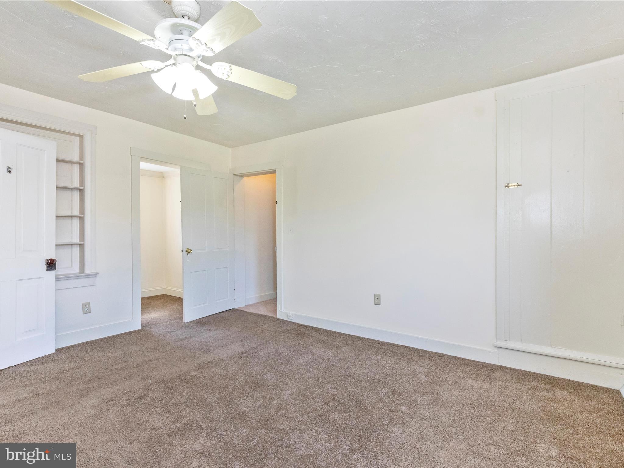 1404 Pleasant Valley Road, Unit 2 Westminster, MD 21158 - Photo 33 of 43 wooden floor in an empty room