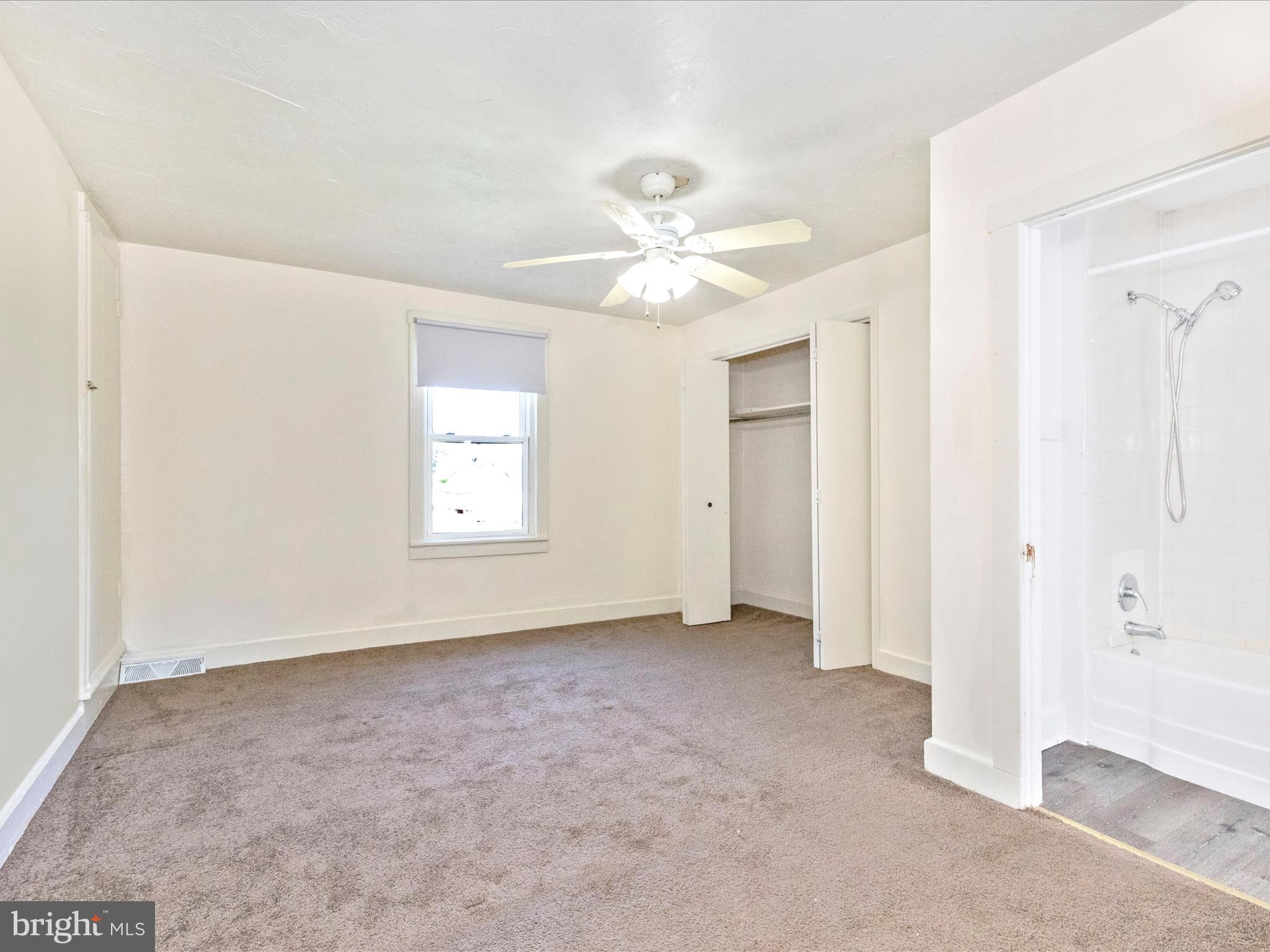 1404 Pleasant Valley Road, Unit 2 Westminster, MD 21158 - Photo 35 of 43 a view of an empty room with a window