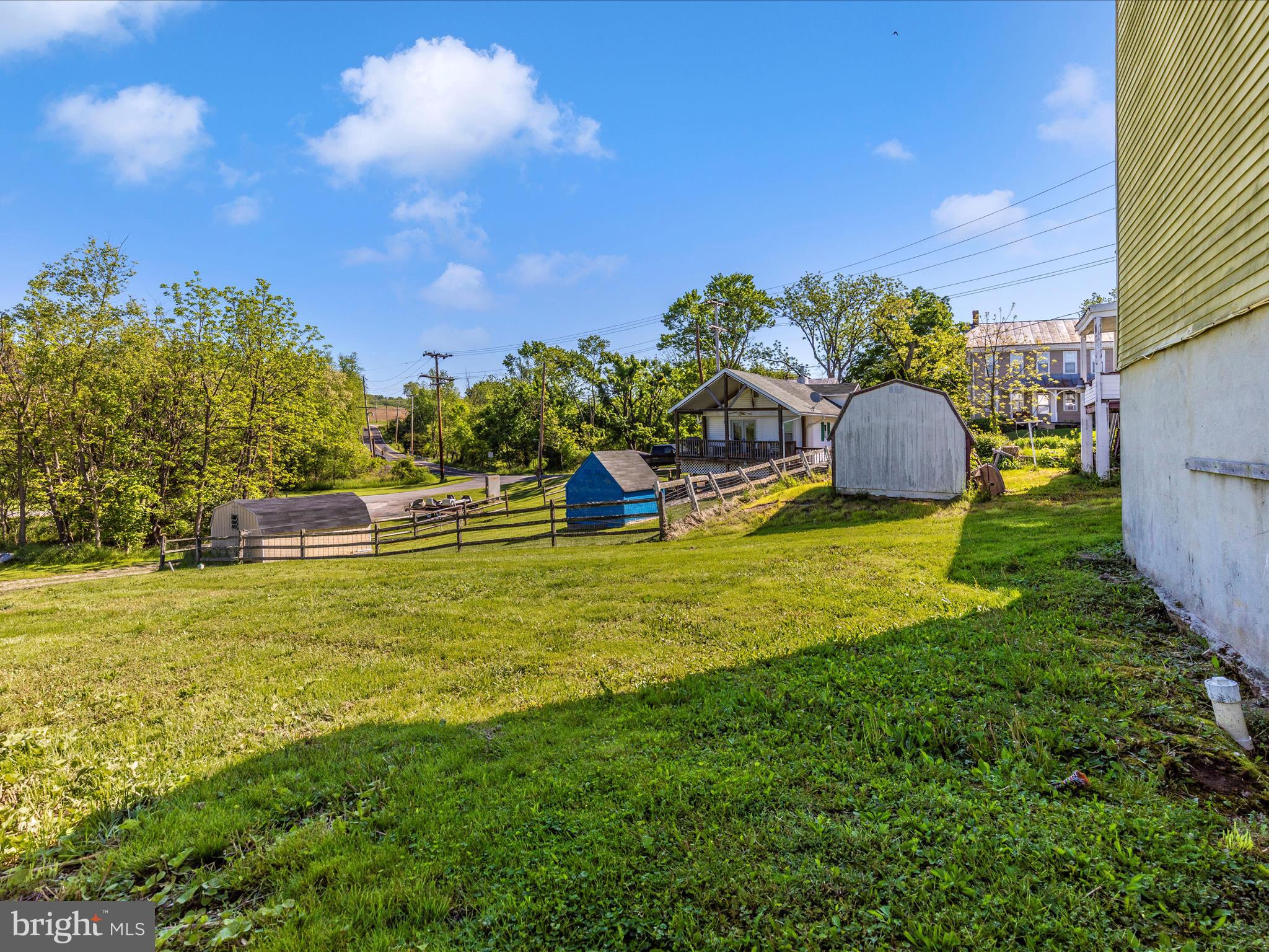 1404 Pleasant Valley Road, Unit 2 Westminster, MD 21158 - Photo 8 of 43 a swimming pool with wooden fence