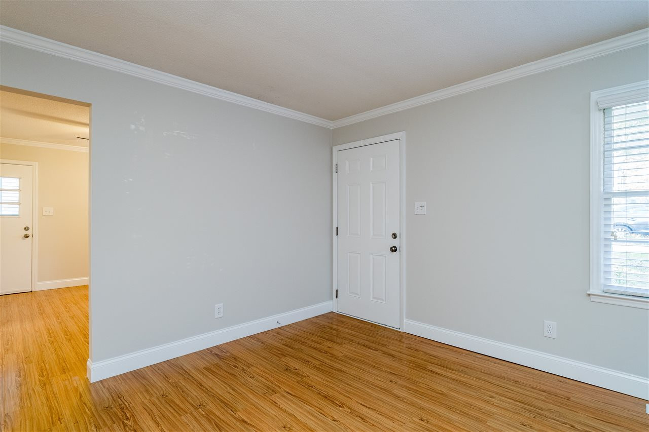 714 New Road Raleigh, NC 27608 - Photo 4 of 25 Fresh paint throughout the entire interior! Move in ready with laminate flooring! Living Room