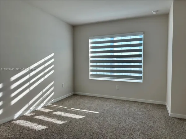a view of a room with a window
