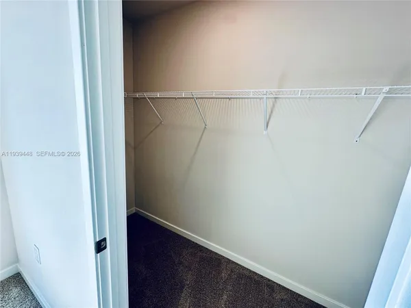 a view of a room with racks on the wall