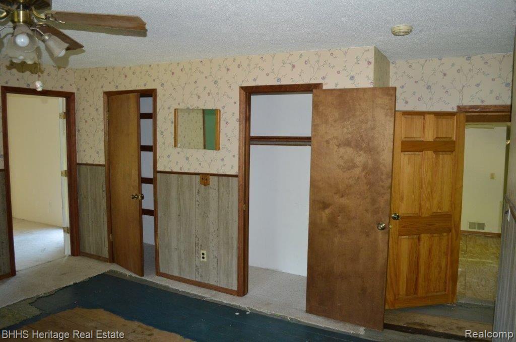 2450 East Coon Lake Road Howell, MI 48843 - Photo 36 of 49 2nd floor main center room