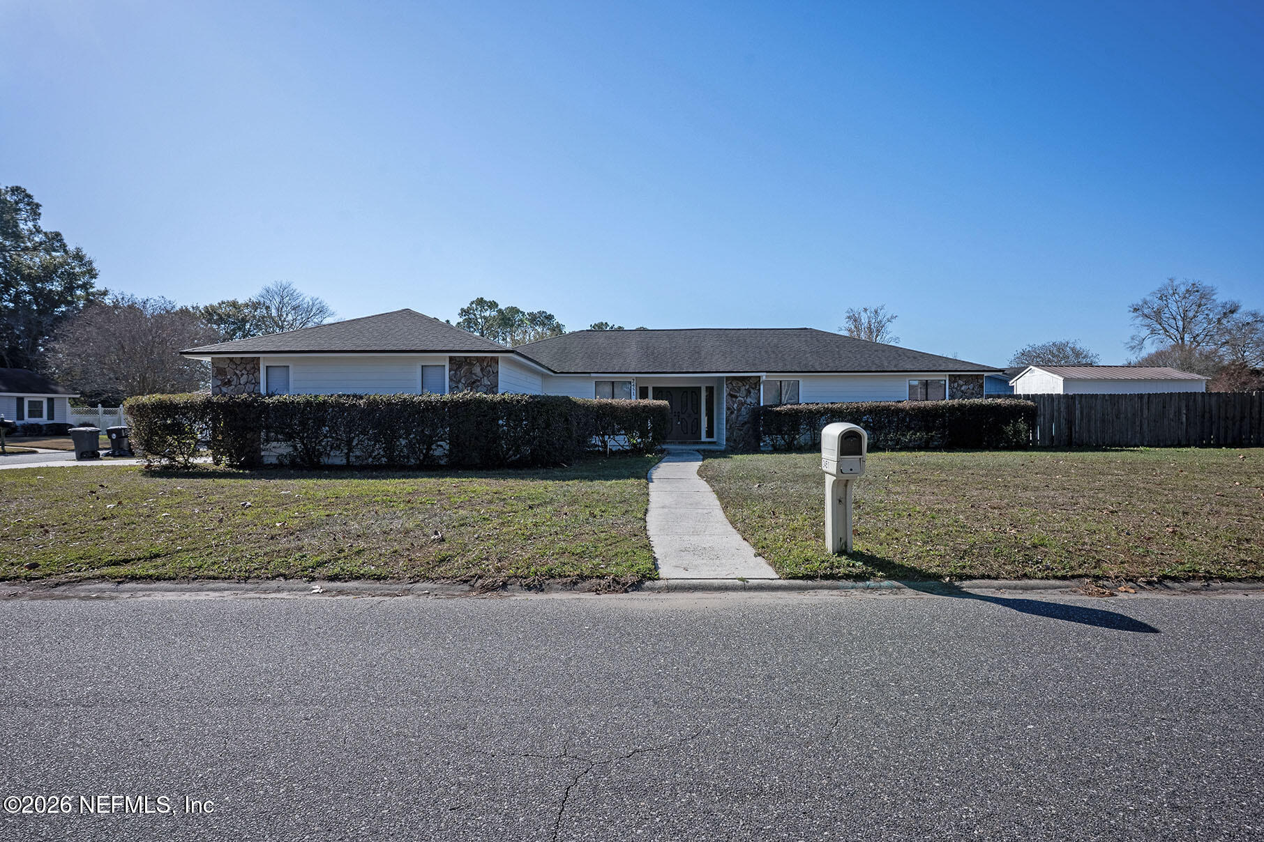 2451 Ridgecrest Avenue Orange Park, FL 32065 - Photo 2 of 57 a view of a house with a yard and large tree