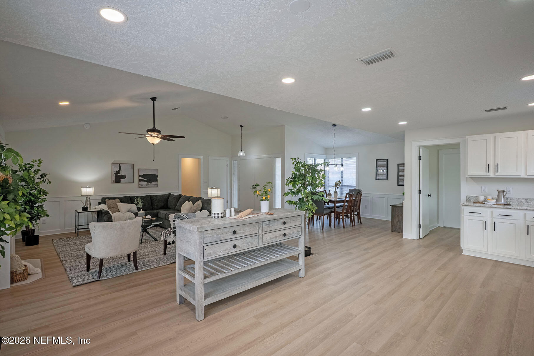 2451 Ridgecrest Avenue Orange Park, FL 32065 - Photo 21 of 57 a living room with furniture and a wooden floor