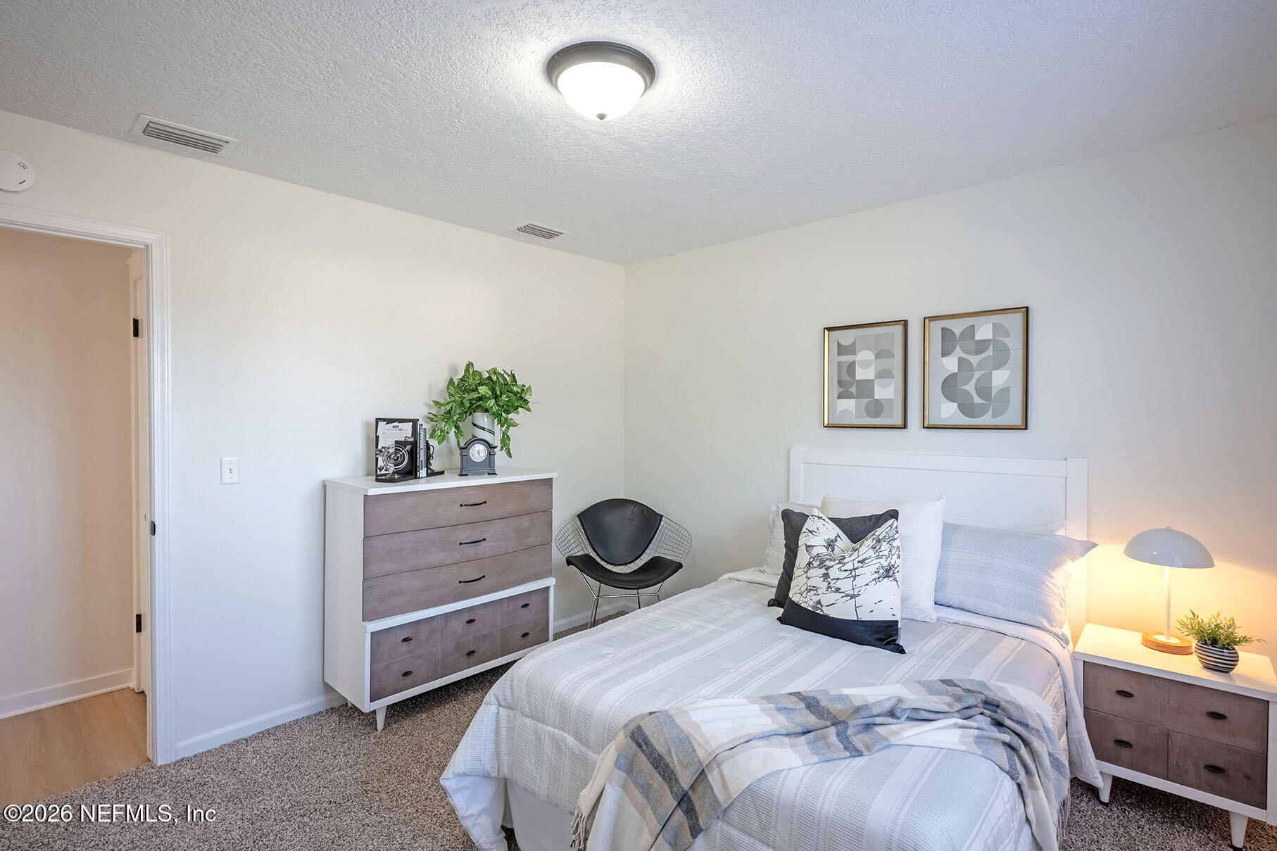 2451 Ridgecrest Avenue Orange Park, FL 32065 - Photo 35 of 57 a bedroom with a bed and a window