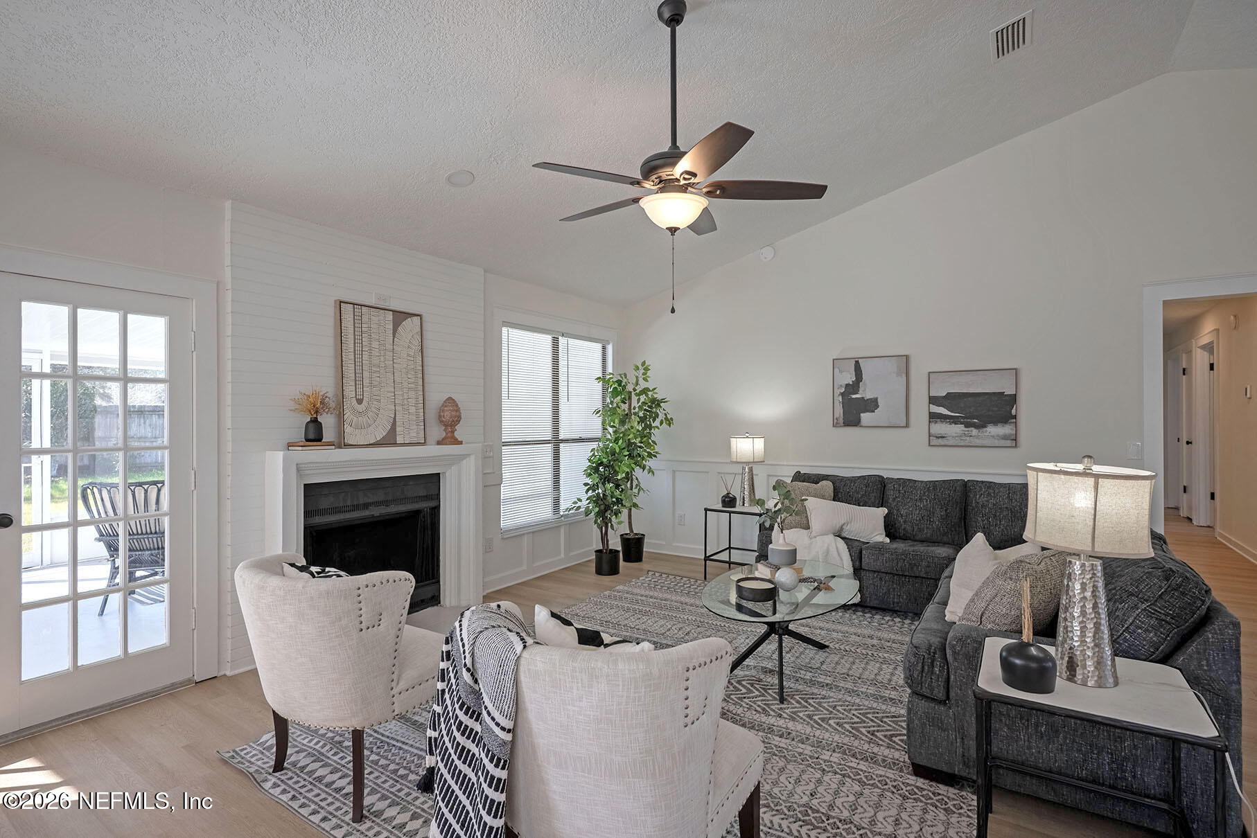 2451 Ridgecrest Avenue Orange Park, FL 32065 - Photo 5 of 57 a living room with furniture fireplace and window