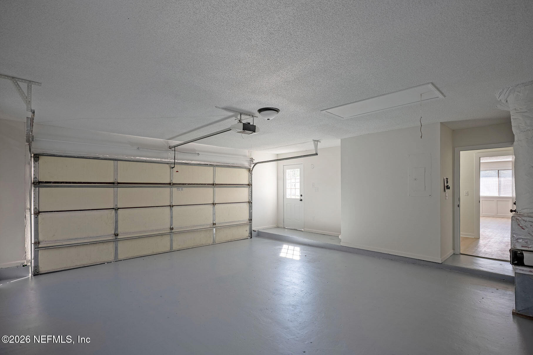 2451 Ridgecrest Avenue Orange Park, FL 32065 - Photo 53 of 57 an empty room with staircase and windows