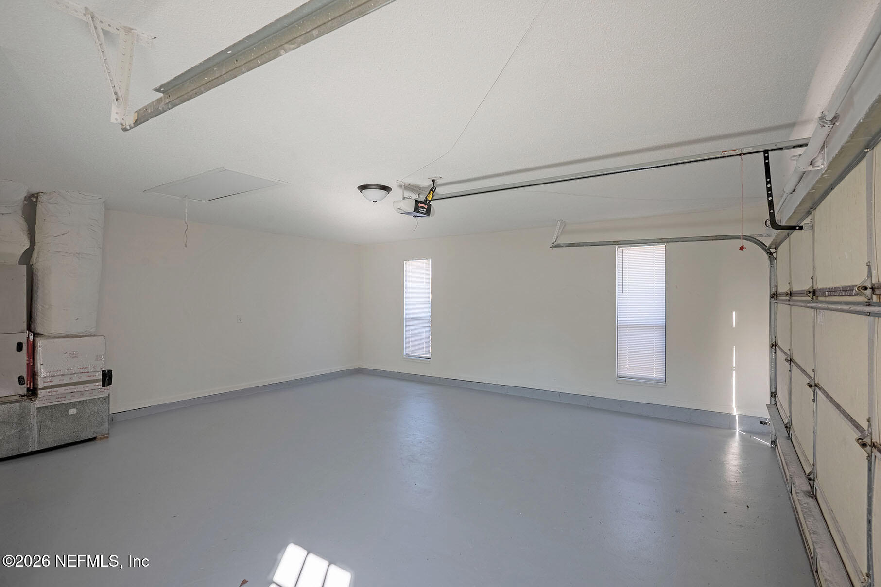 2451 Ridgecrest Avenue Orange Park, FL 32065 - Photo 54 of 57 a view of an empty room with a window