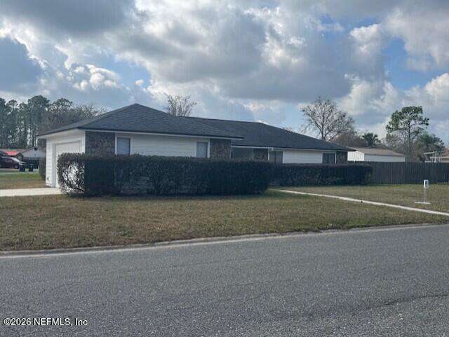 2451 Ridgecrest Avenue Orange Park, FL 32065 - Photo 57 of 57 a view of a house with a yard and large tree