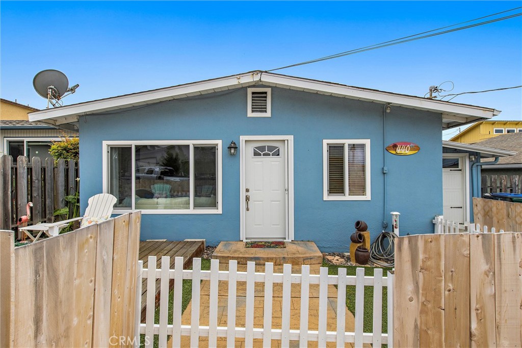 440 Java Street Morro Bay, CA 93442 - Photo 22 of 22 a front view of a house with a yard